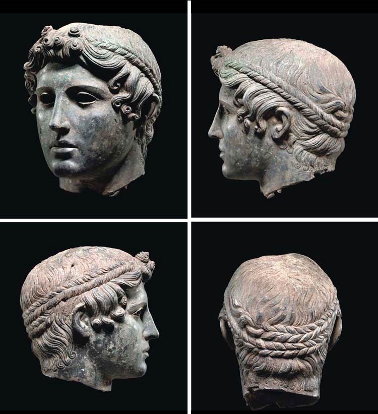 A GREEK BRONZE HEAD OF A YOUTH