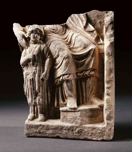 A TARENTINE LIMESTONE RELIEF FRAGMENT