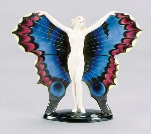 A GOLDSCHEIDER POLYCHROME FIGURE OF "THE BUTTERFLY DANCER",