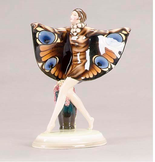 A GOLDSCHEIDER POLYCHROME FIGURE OF "THE BUTTERFLY GIRL",