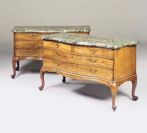 A PAIR OF GEORGE III MAHOGANY SERPENTINE COMMODES