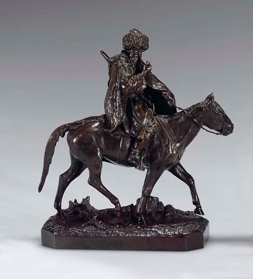 A BRONZE EQUESTRIAN FIGURE