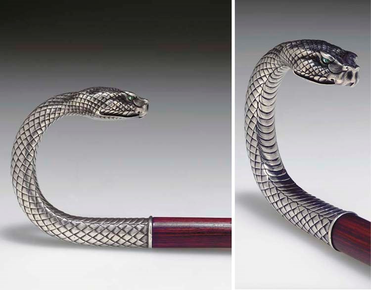 A SILVER CANE HANDLE