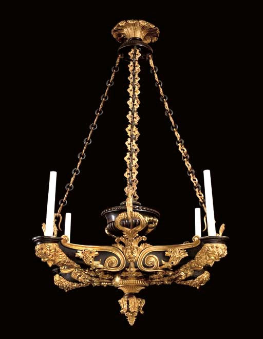 A REGENCY ORMOLU AND PATINATED BRONZE FOUR-LIGHT COLZA CHANDELIER