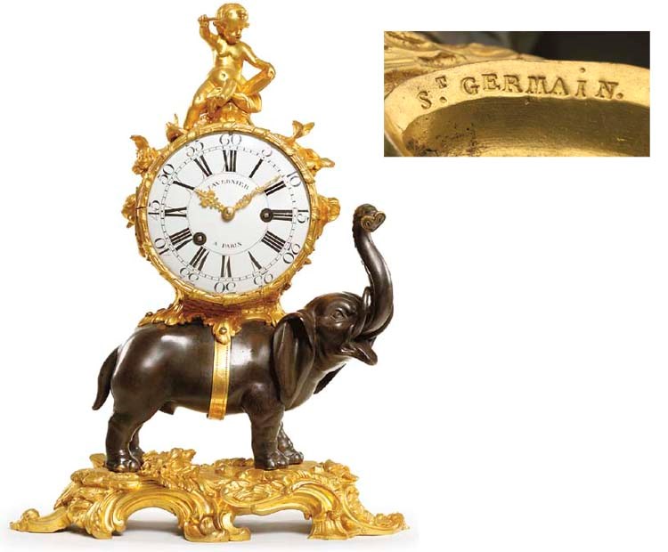 A LOUIS XV ORMOLU AND PATINATED BRONZE MANTEL CLOCK