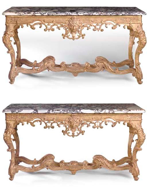 A MATCHED PAIR OF REGENCE GILTWOOD CONSOLE TABLES