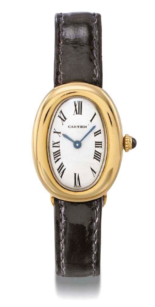 Cartier. An 18K gold oval wristwatch