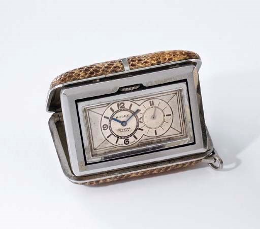 Rolex. A rare chrome and leather purse watch