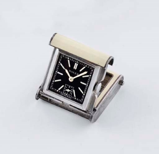 Rolex. An unusual silver and enamel purse watch