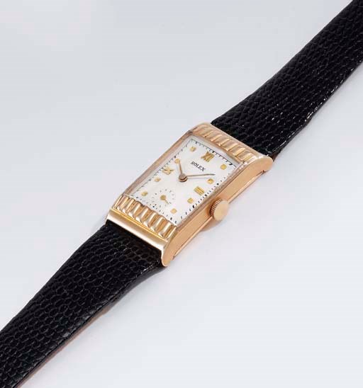 Rolex. An unusual 18K pink gold rectangular wristwatch