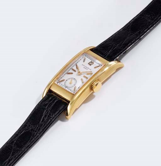 Patek Philippe. A fine and rare 18K gold rectangular wristwatch