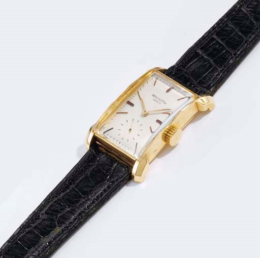 Patek Philippe. A fine and rare 18K gold rectangular wristwatch with unusual lugs