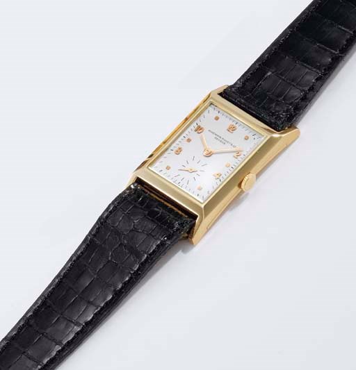 Audemars Piguet. A fine 18K gold rectangular curved wristwatch
