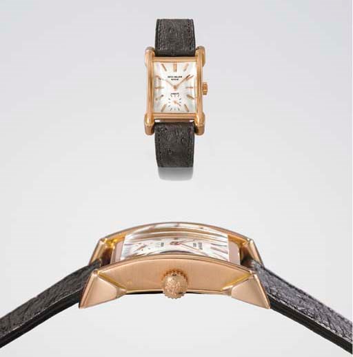 Patek Philippe. An extremely fine, rare and large 18K pink gold rectangular-shaped wristwatch with unusual lugs