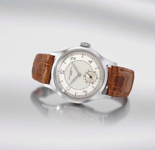 Patek Philippe. A fine and rare stainless steel wristwatch with two-tone silvered dial