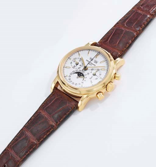 Patek Philippe. A fine 18K gold perpetual calendar chronograph wristwatch with phases of the moon