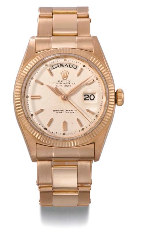 Rolex. A fine 18K pink gold self-winding calendar wristwatch with sweep centre seconds and bracelet
