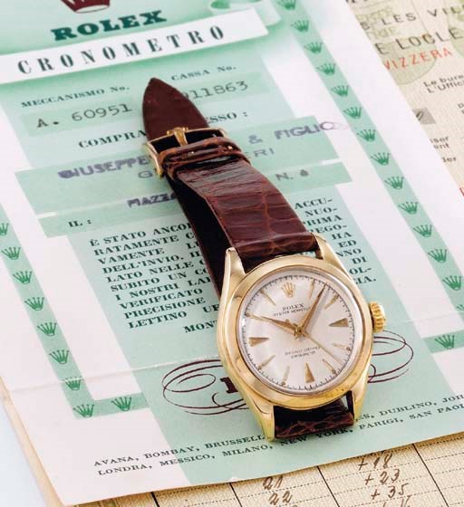 Rolex. A lady's unusual and rare 18K gold self-winding wristwatch with sweep centre seconds, original certificates and box