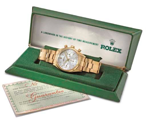 Rolex. A very fine and rare 18K gold chronograph wristwatch with bracelet