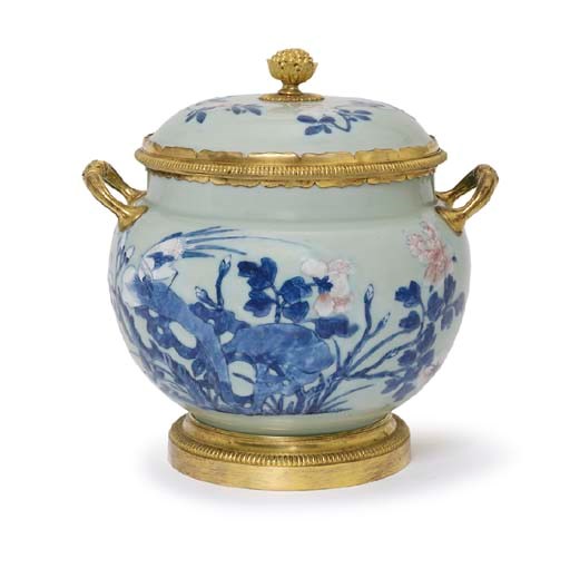 A CHINESE ORMOLU-MOUNTED UNDERGLAZE BLUE, RED AND WHITE CELADON-GROUND PORCELAIN JAR AND COVER