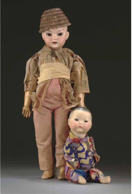 A German Oriental bisque-headed doll