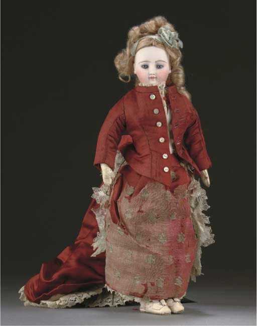 A pressed bisque fashionable doll