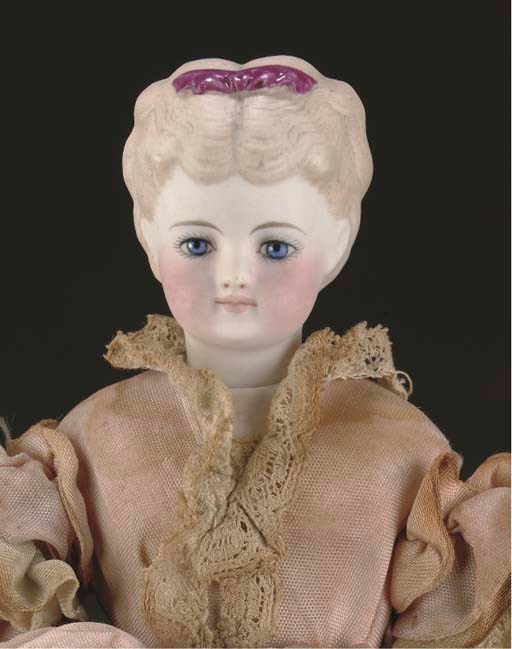 A rare German bisque-headed fashionable doll