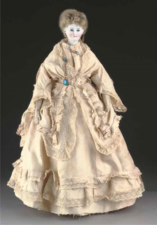 An unusual white bisque shoulder-headed lady doll