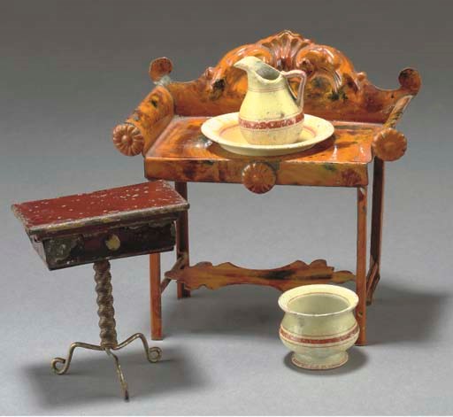 An Evans and Cartwright painted tinplate washstand