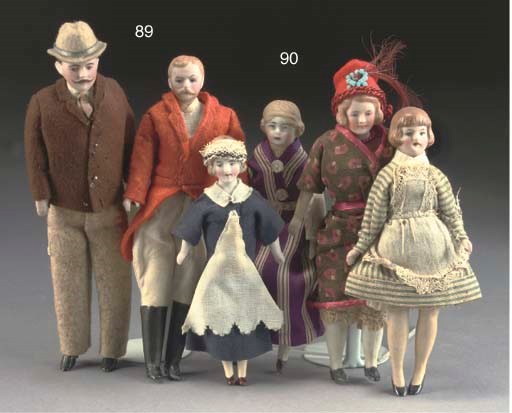 Four bisque-headed dolls' house dolls