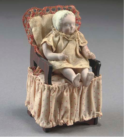 A rare Sonnenberg composition baby in highchair squeak toy