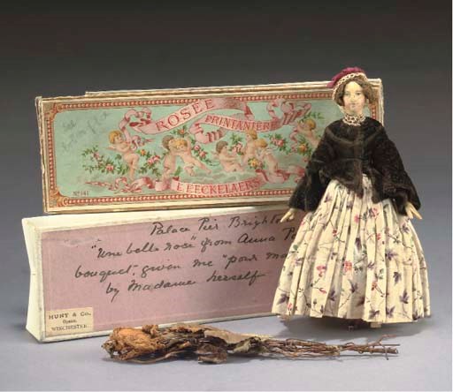A Sonnenberg papier-mache headed dolls' house doll