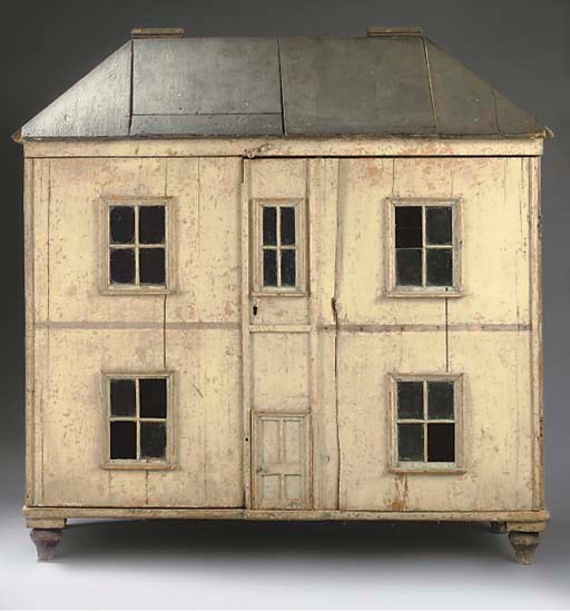 A LARGE CARPENTER-BUILT WOODEN DOLLS' HOUSE