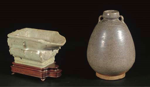 A Chinese pale green glazed archaistic ritual pouring vessel, Guang
