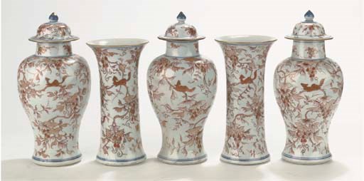 A five-piece iron-red and gilt garniture