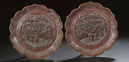 A pair of red lacquer floriform dishes