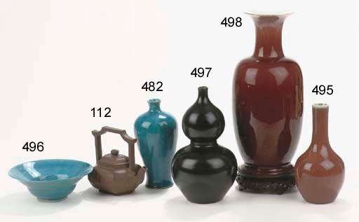 A black glazed vase