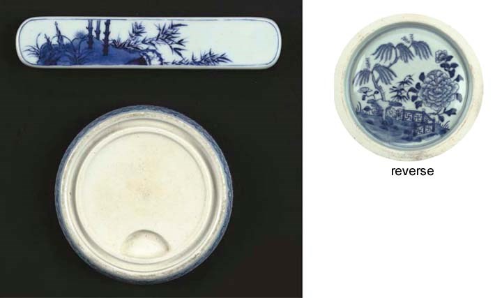 A blue and white scrollweight and a washer