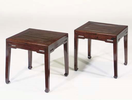A pair of lacquered hardwood square stools