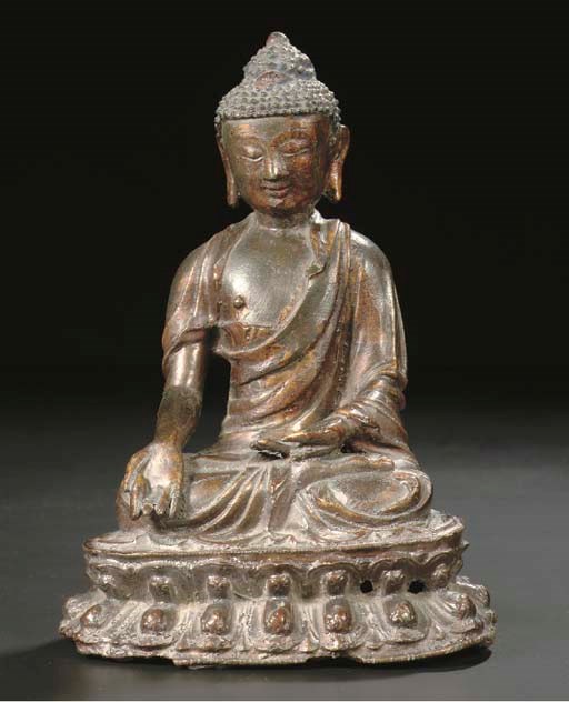 A Sino Tibetan lacquered bronze figure of Bhaisajyaguru