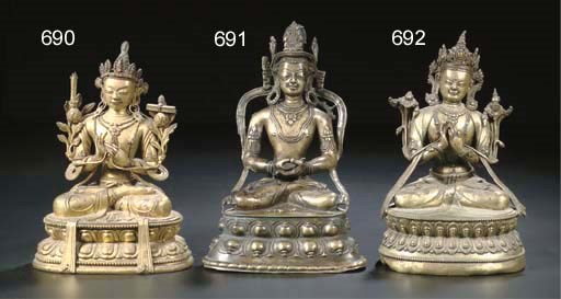 A Sino Tibetan gilt-bronze figure of Manjusri