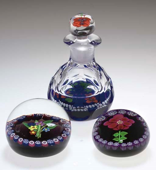 A CAITHNESS SCENT-BOTTLE AND STOPPER AND TWO PAUL YSART WEIGHTS
