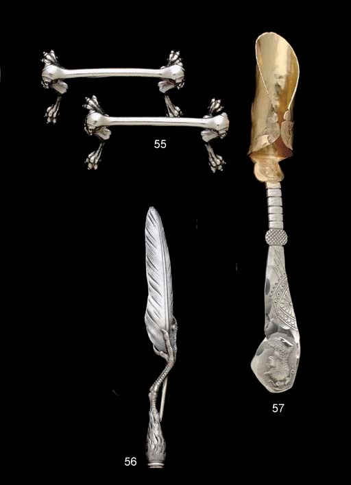 A PARCEL-GILT SILVER CHEESE SCOOP