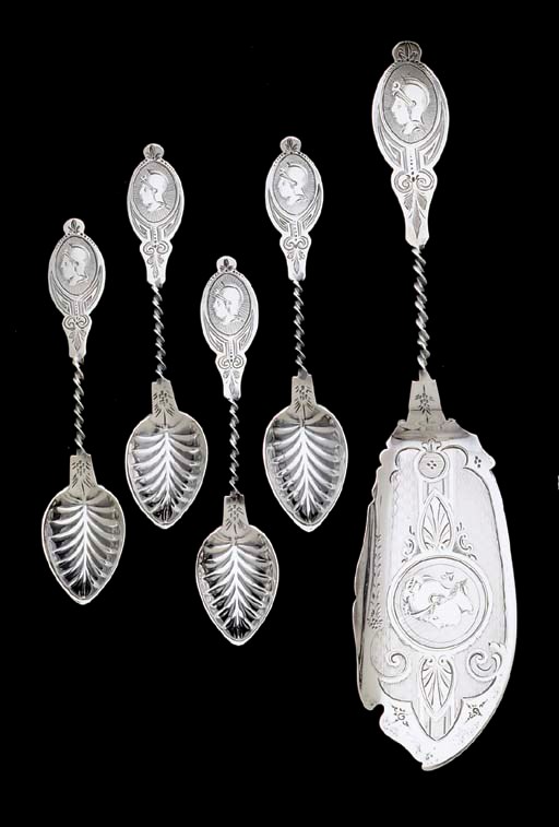 A SILVER ICE CREAM SERVING SET