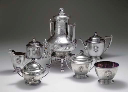 A SILVER SEVEN-PIECE TEA SERVICE**