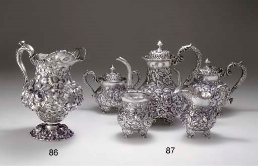 A SILVER FIVE-PIECE TEA AND COFFEE SERVICE**