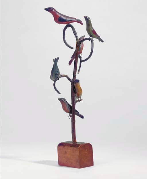 A CARVED AND PAINTED WOODEN BIRD TREE