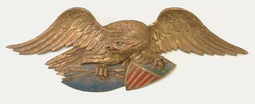 A CARVED AND GILTWOOD SPREAD-WING EAGLE