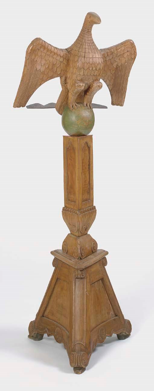 A CARVED AND PAINT-DECORATED WOOD AND IRON EAGLE LECTERN