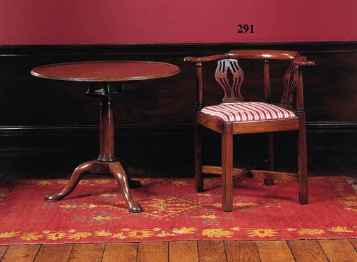 An early George III mahogany corner elbow chair